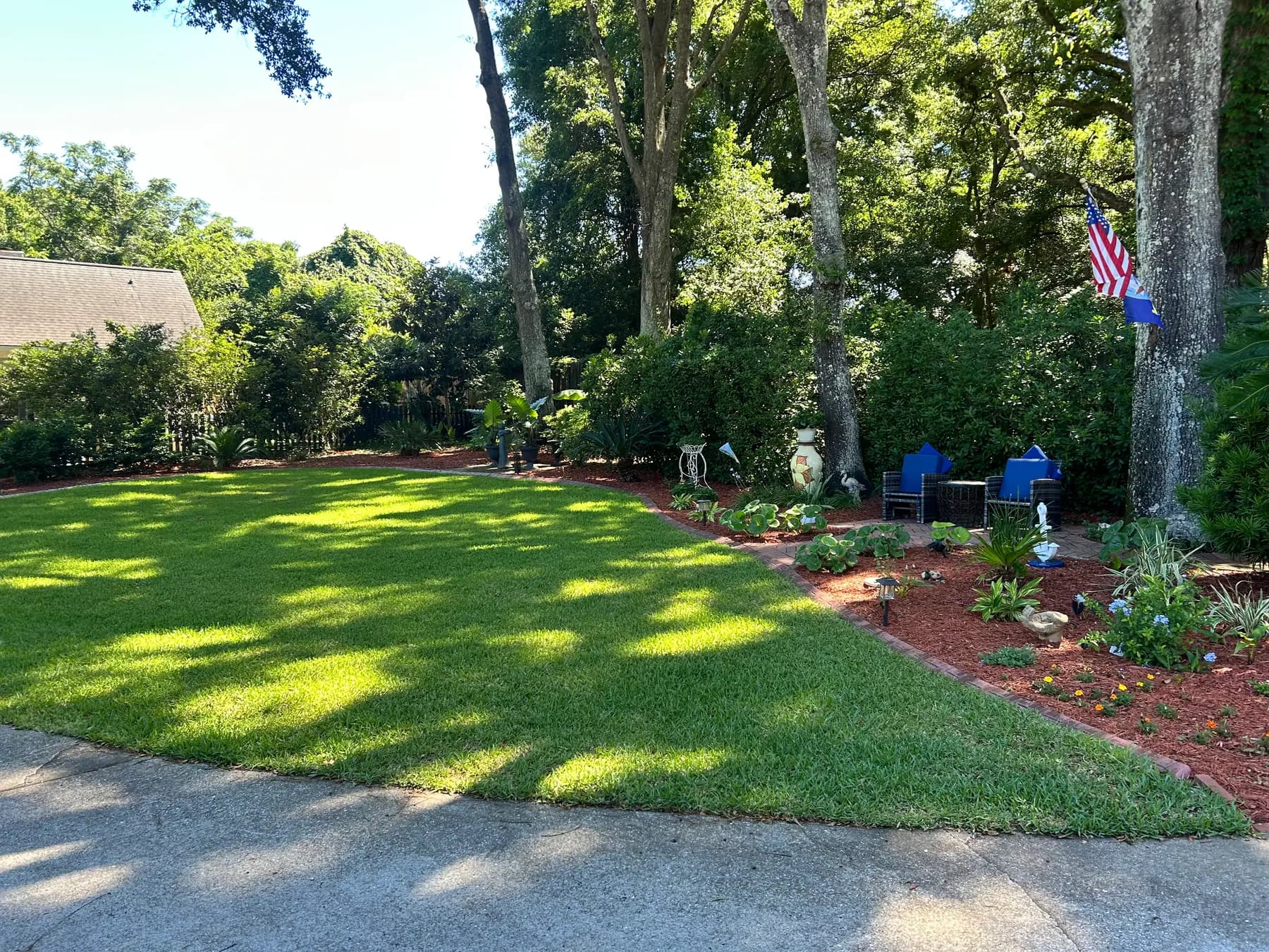 Clean Mount Pleasant yard with fresh mulch beds after a property refresh