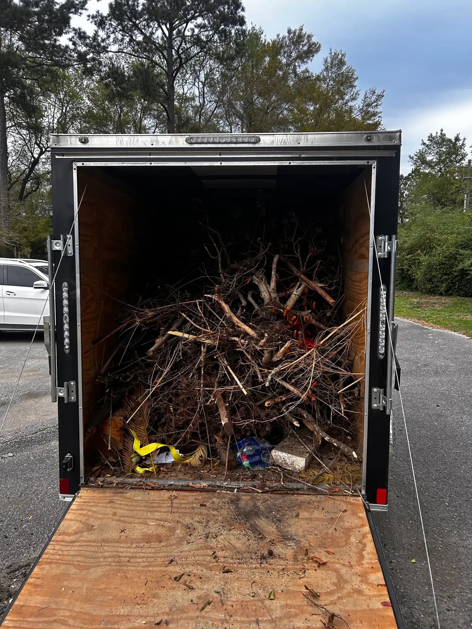 Trailer loaded with non-hazardous yard and project debris